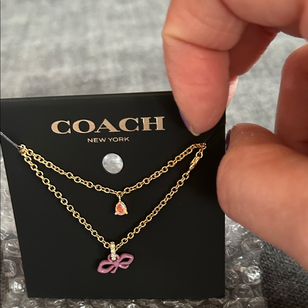 Coach Gold Necklace with Pink Bow Charm